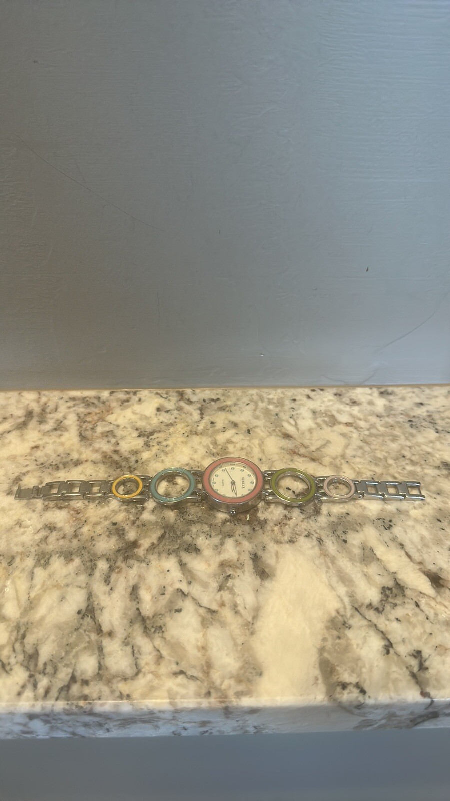 Geneva ladies watch silver tone with pink blue yellow green needs battery