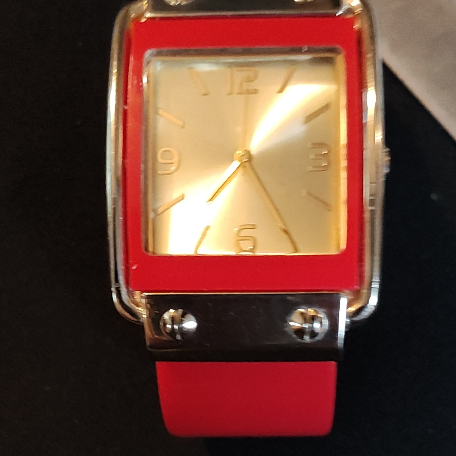 Rectangular Wristwatch Red Bangle Silver Red Case Analog Gold Sunburst Dial.