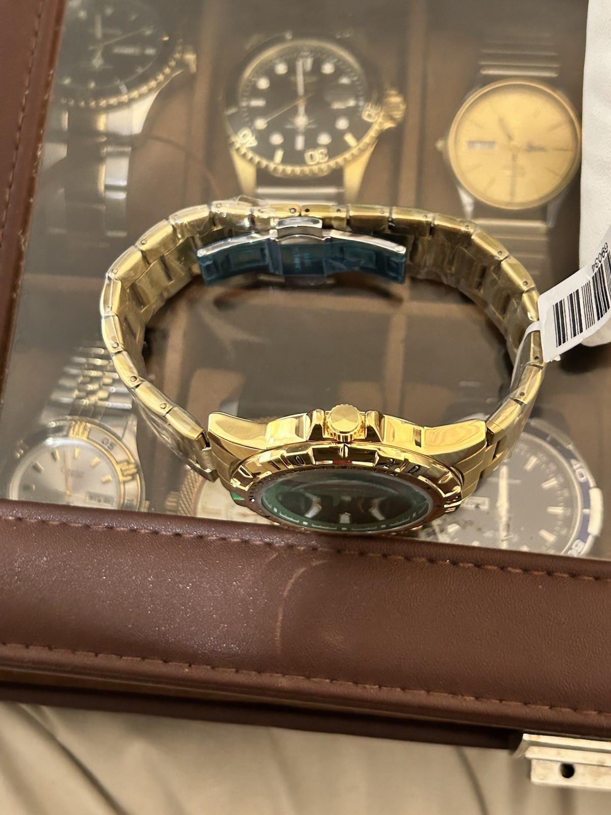 Invicta Specialty men’s watch (model 69034) a 42mm gold tone case green dial