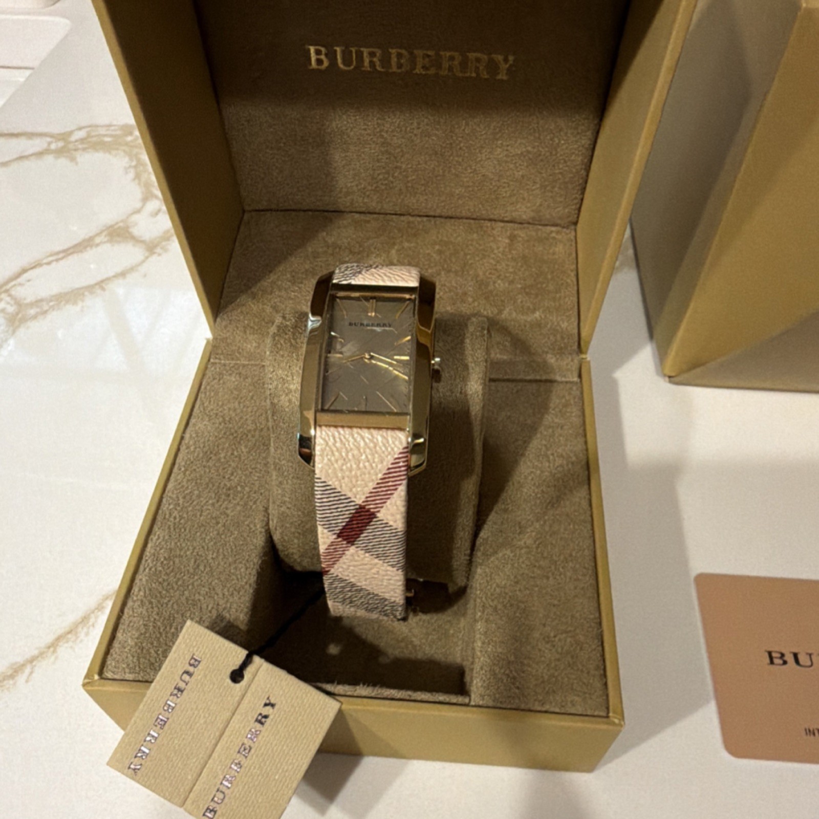 Burberry Women’s Swiss Made Quartz Rectangular Gold Tone Watch Beige Strap w/Box