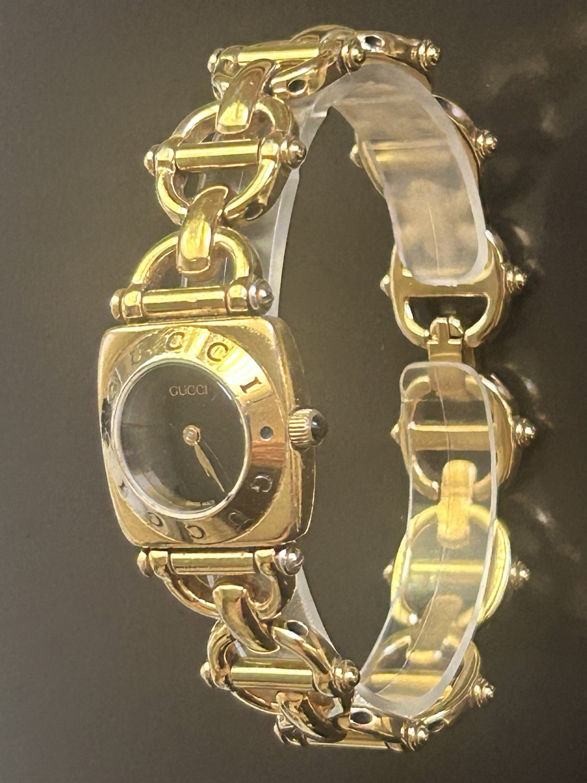 Gucci wmns lovely 6 1/2″ gold-black link watch, new battery free ship $424.99