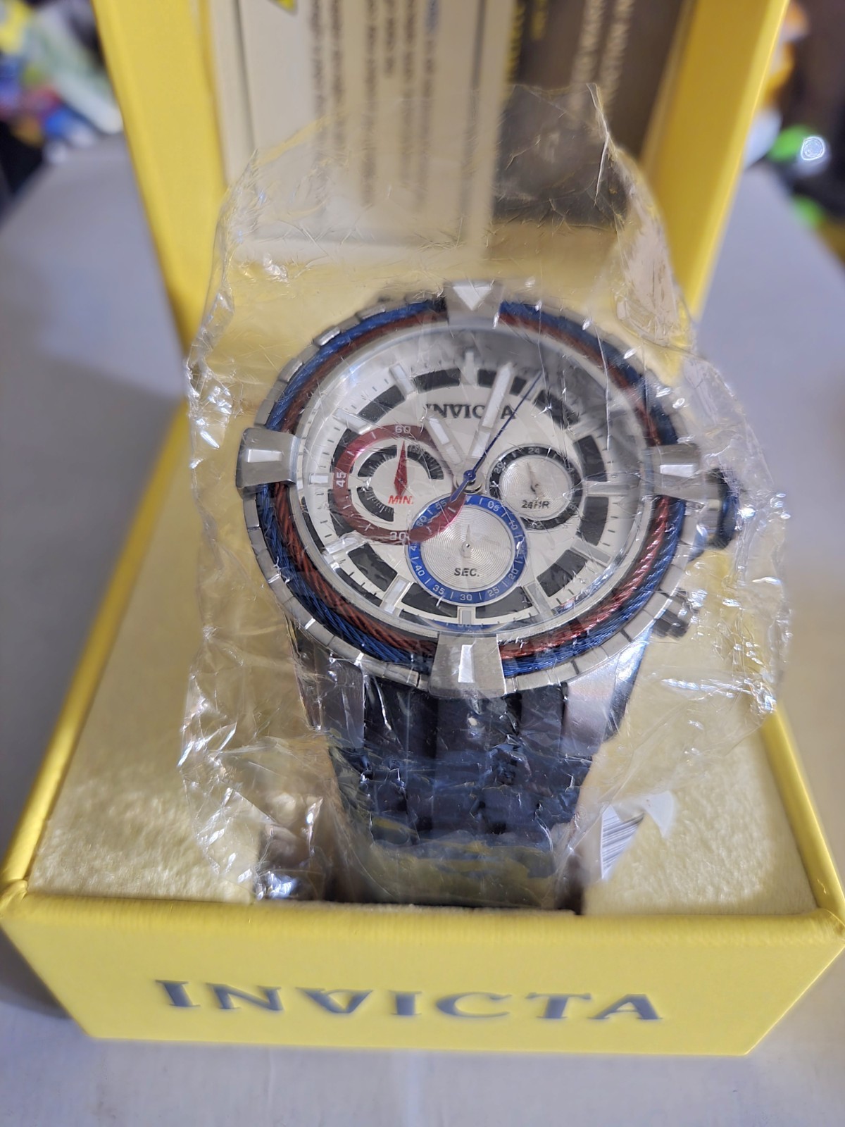 Invicta 49mm Bolt Chronograph Red, Blue, Silver Dial Black/Red Silicone Band