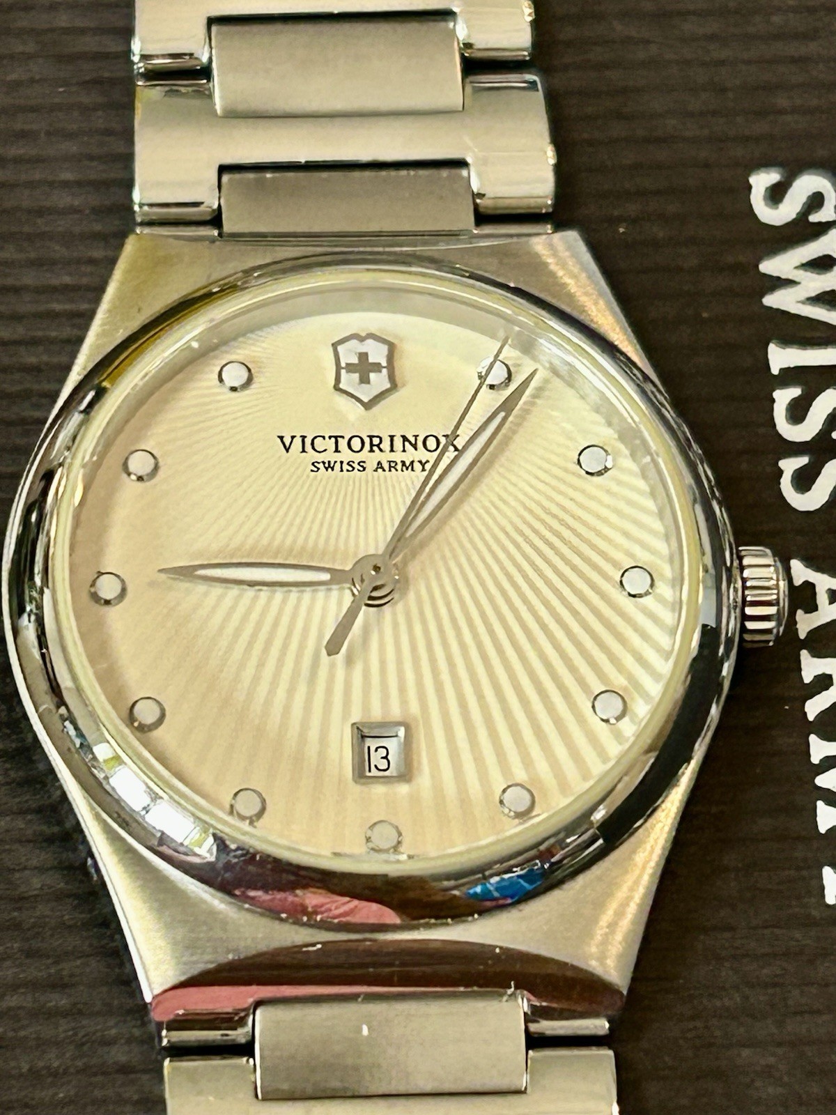Victorinox, Sapphire Crystal, 28mm, 7.25” Wrist, WR 100m, Date, New/Box/Booklet