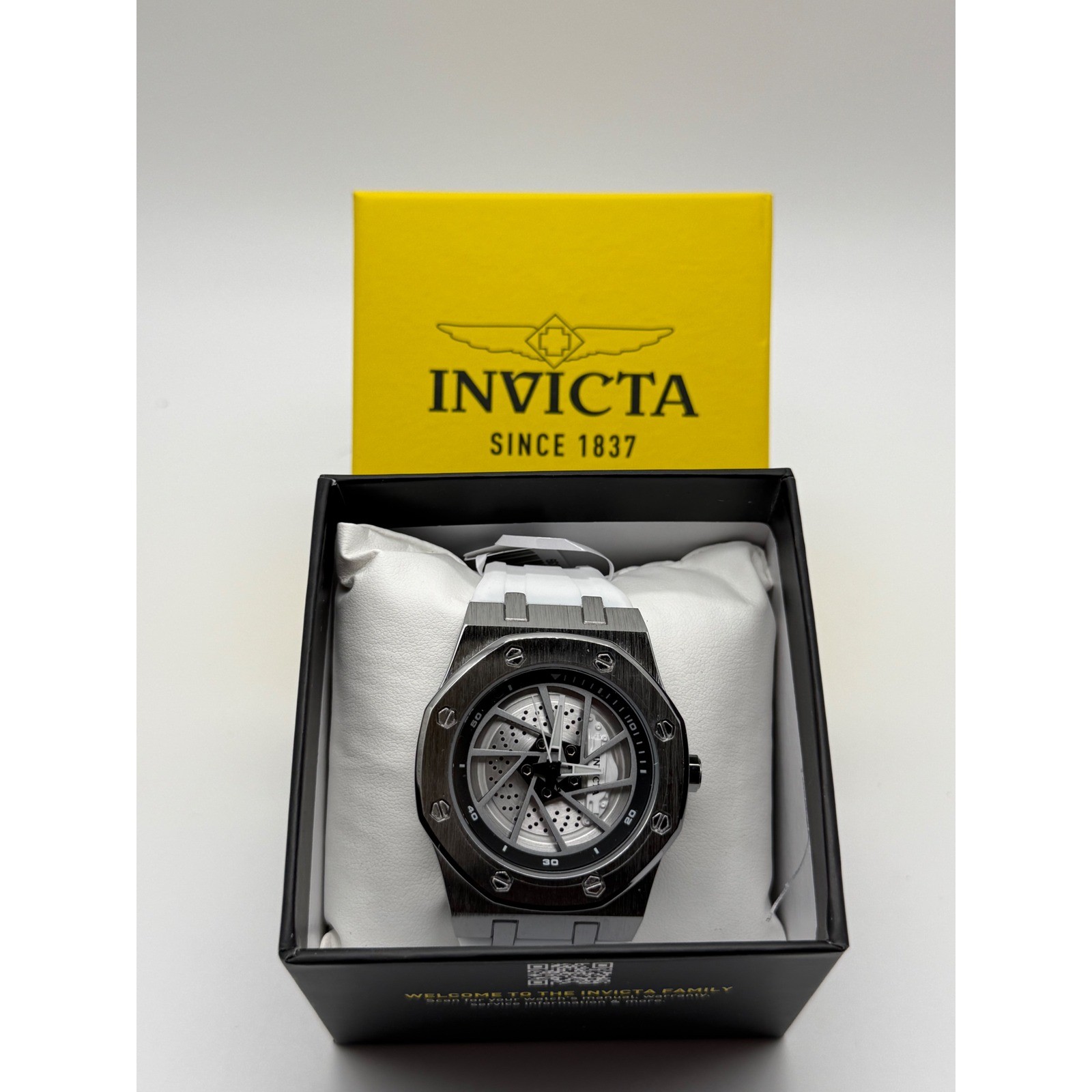 Invicta 70039 Men’s Watch Silver Tone Skeleton Dial White Silicone Strap New Box