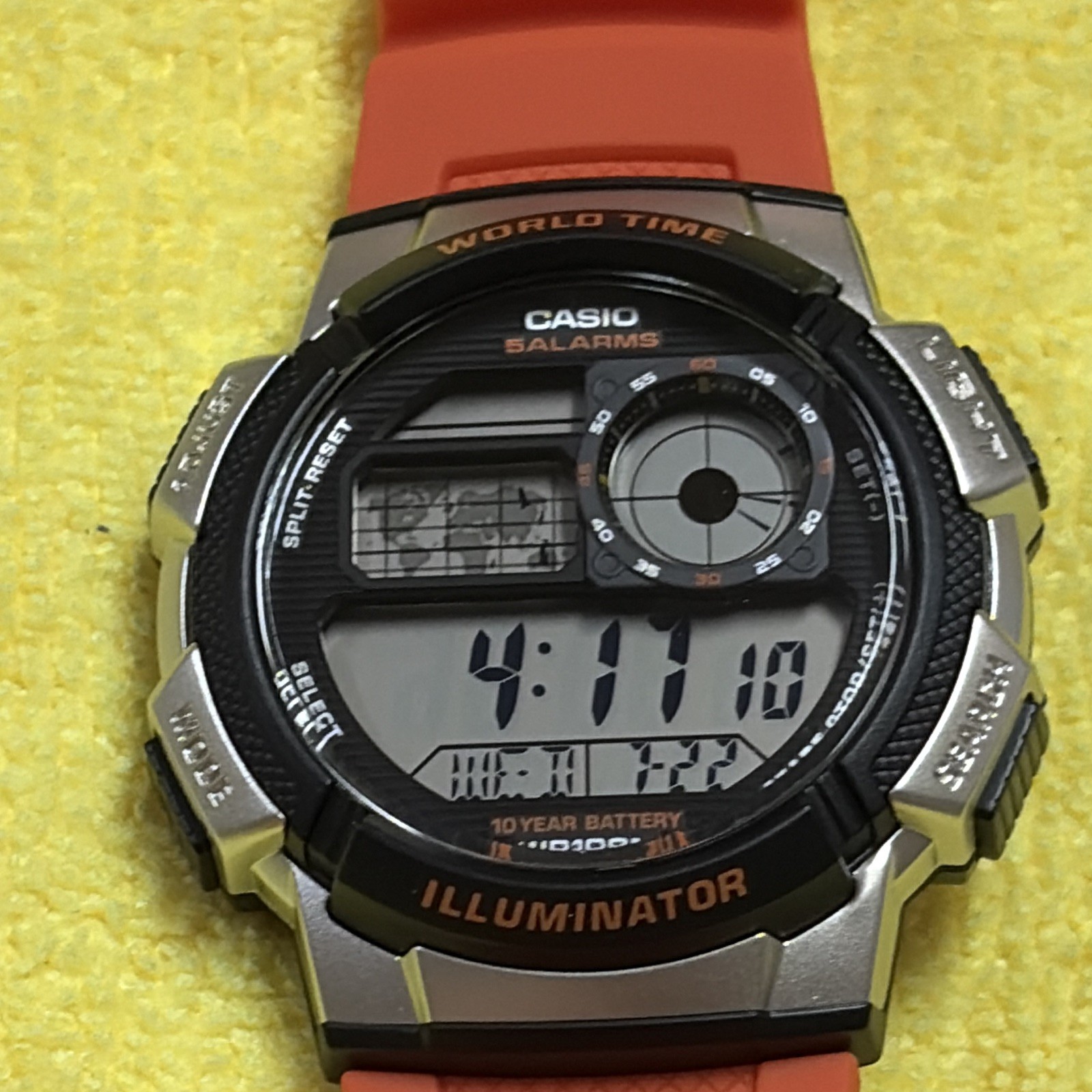 Casio AE-1000W World Time Illuminator Quartz Digital Watch Orange Resin WR 100m