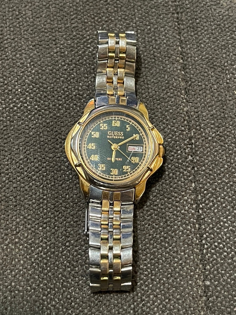 Mens Guess Waterpro day/date watch. green dial