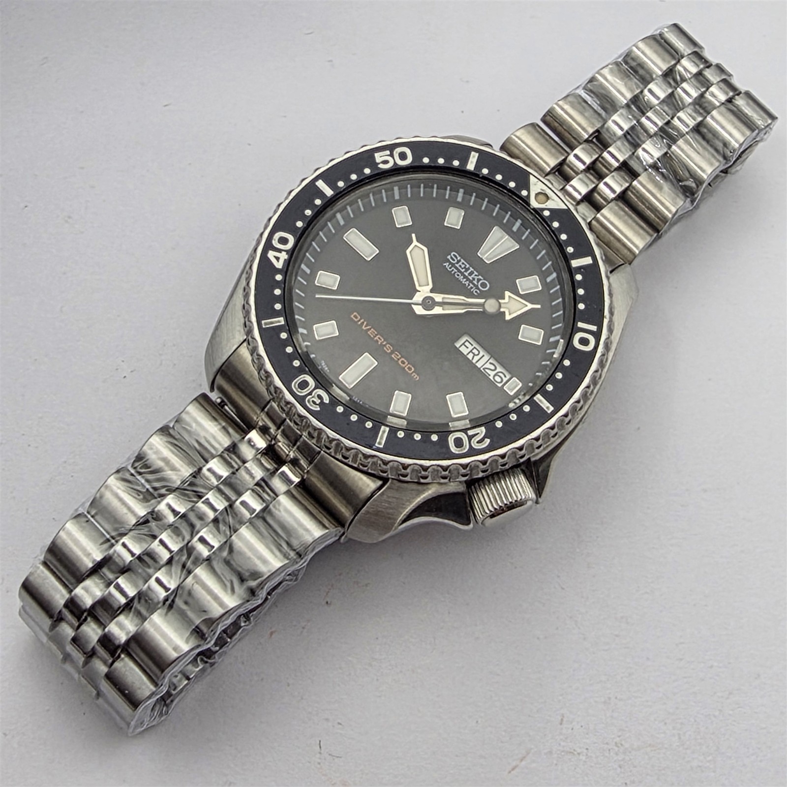 10′ SEIKO 7S26 0020 SKX007 SS MENS DAY DATE 050054 SERVICED WATCH US TARIFF PAID