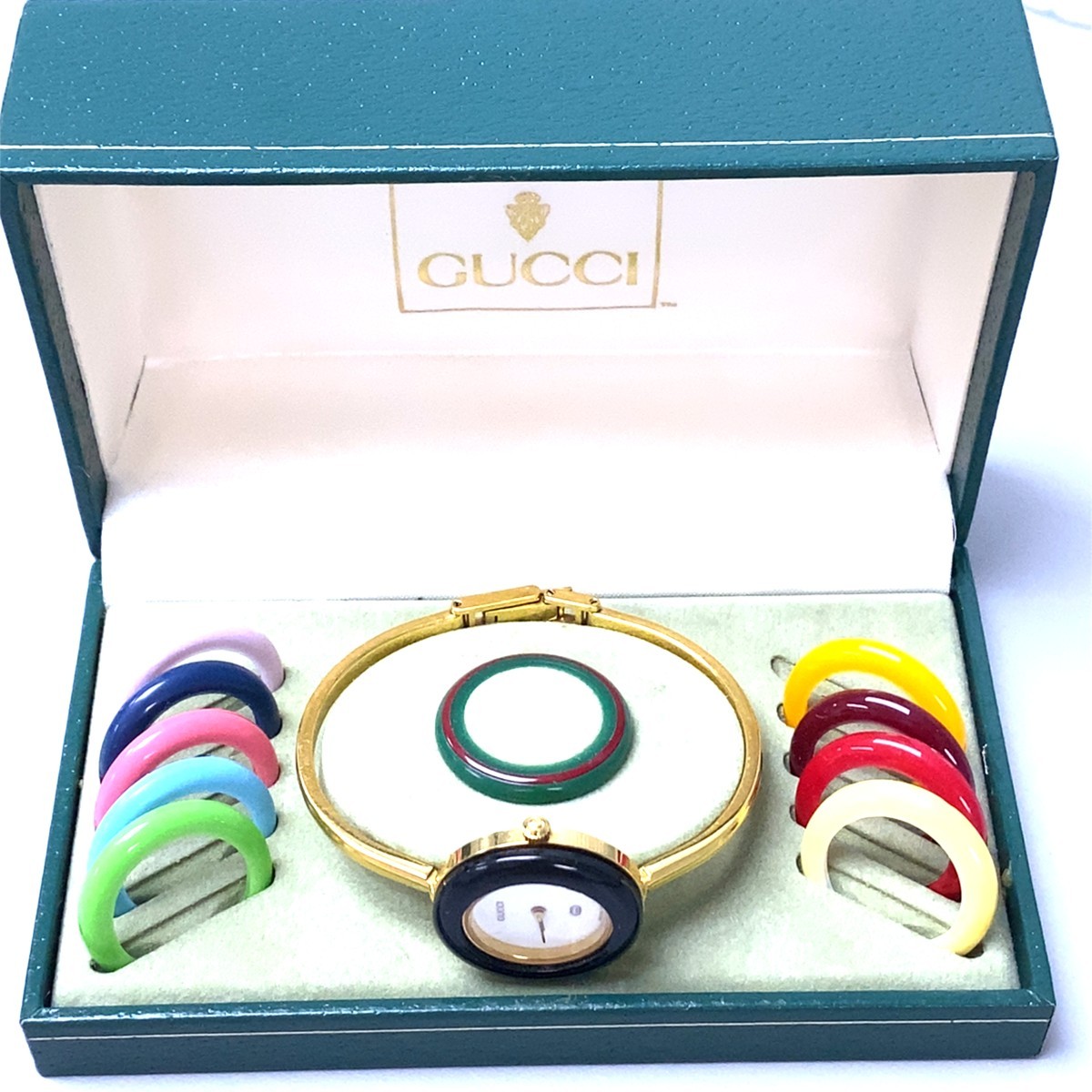Gucci 1100-L Change Bezel Gold-tone ladies Watch (C31035530)