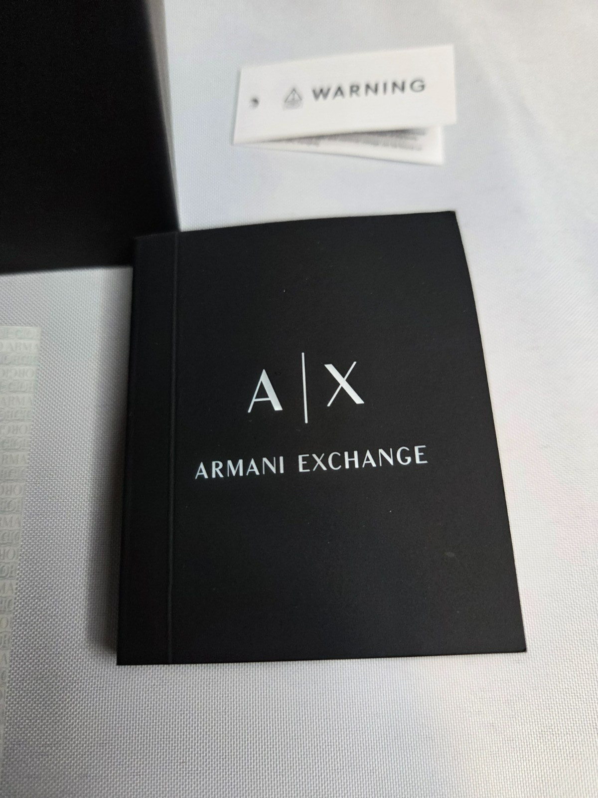 Armani Exchange Two-Tone IP Chronograph Watch with Black Dial and Chain Bracelet
