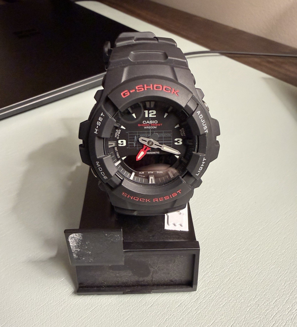 Casio G-SHOCK G-100 Men’s Analog Quartz Watch, Shock/Magnetic Resist, 200m WR