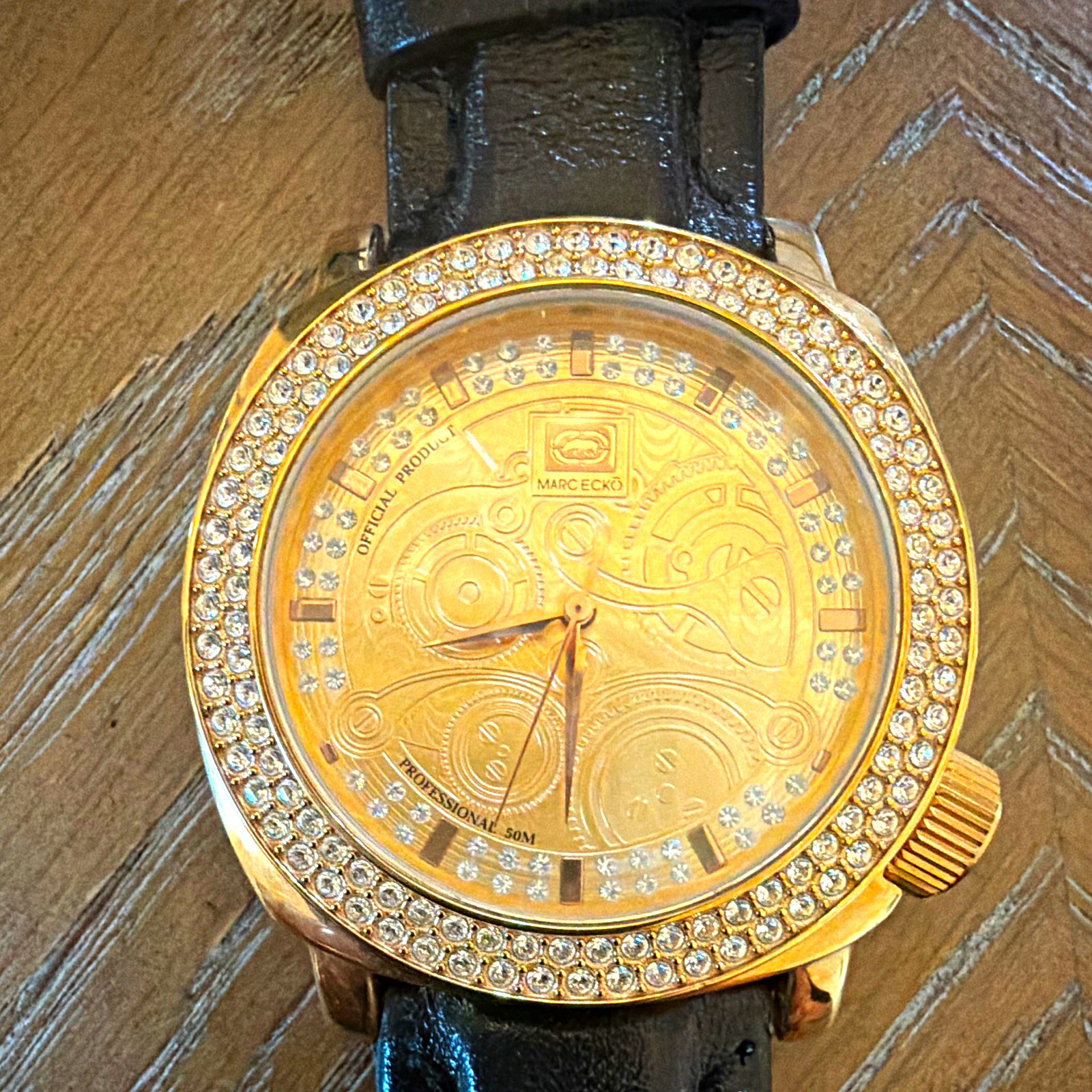 Marc Ecko E10525G1 Quartz Analog Watch Gold Dial Black Leather Strap 52mm 50m