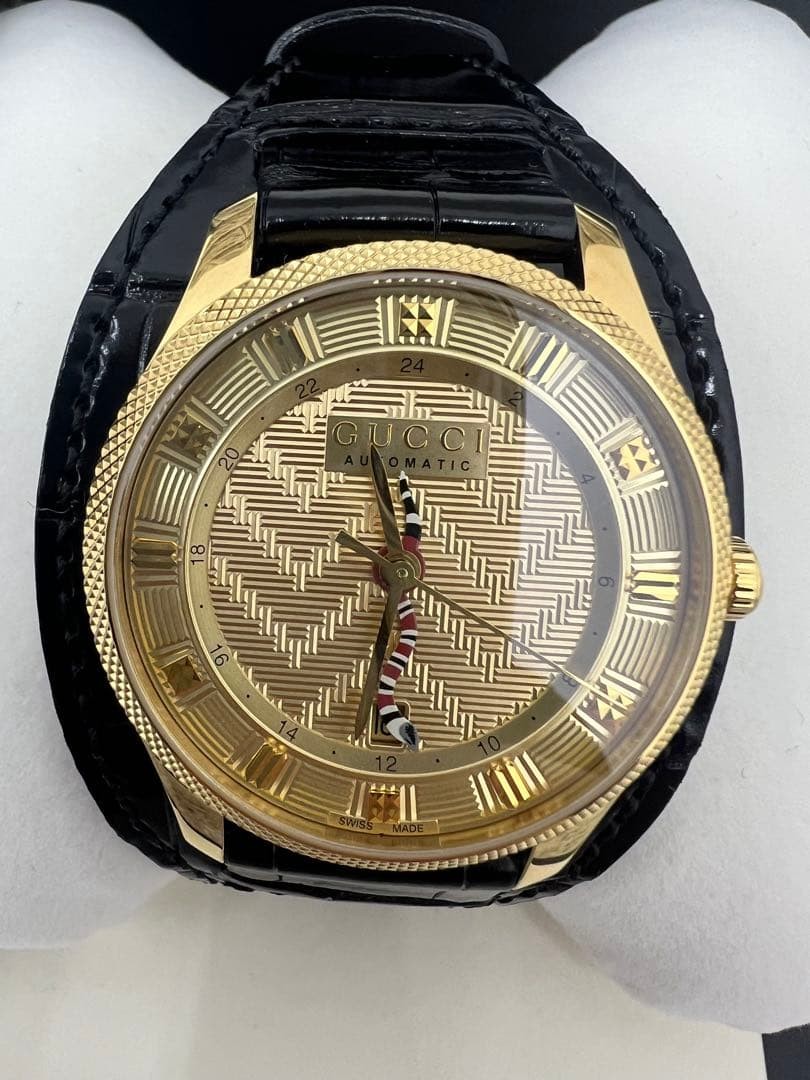 GUCCI Eryx Automatic Gold Dial Black Leather Watch