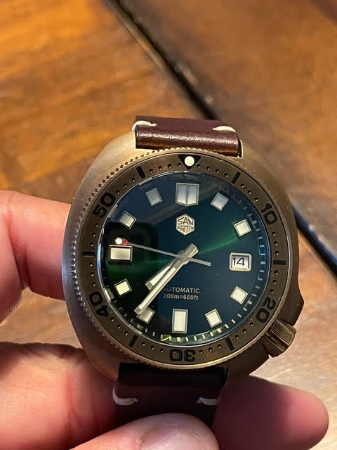 San Martin SN047-Q, Bronze Willard homage with beautiful green dial.