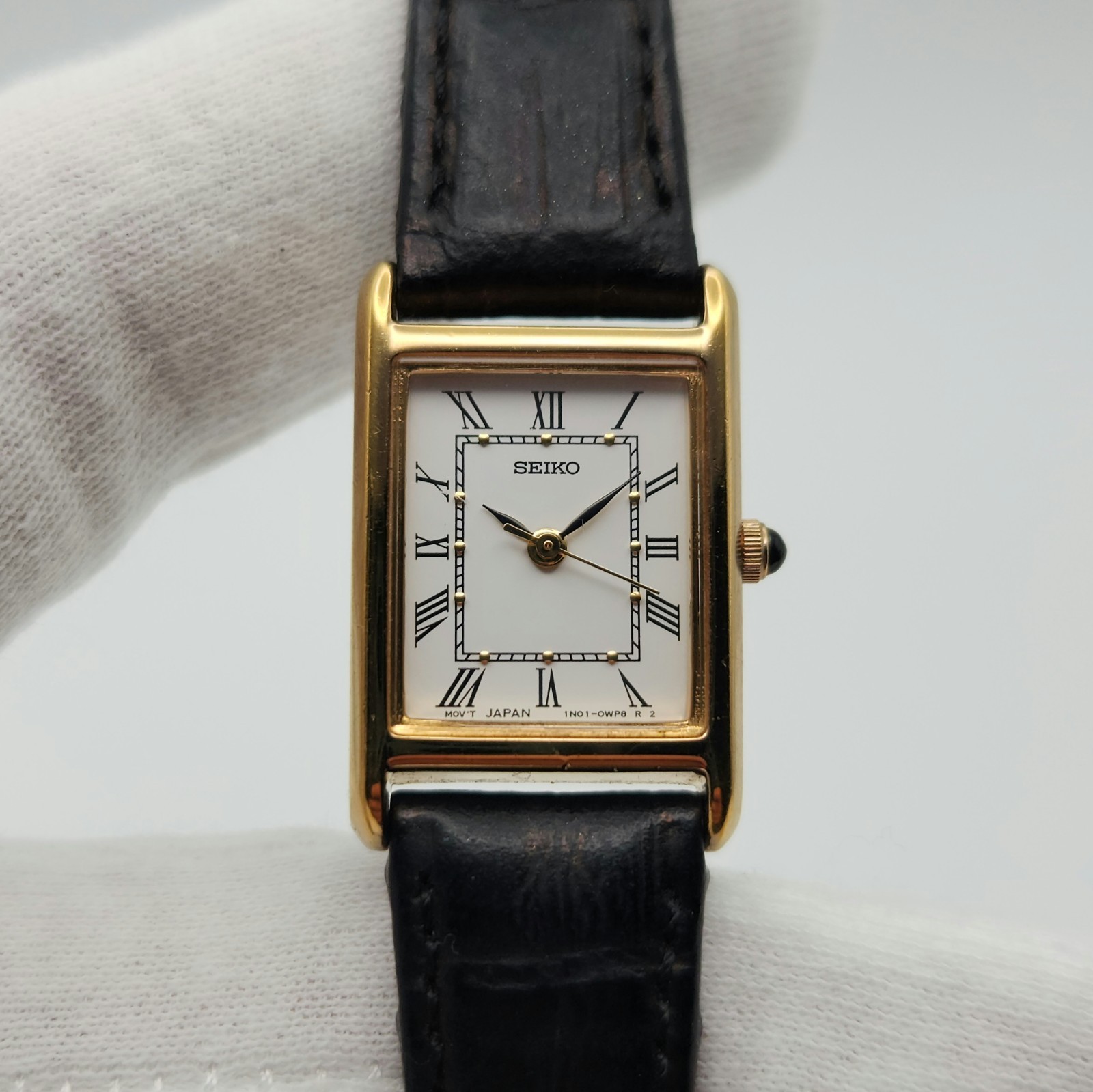 Seiko Ladies Tank-Style Gold Tone w/ Roman Numerals Quartz Watch 1N01-0LK0