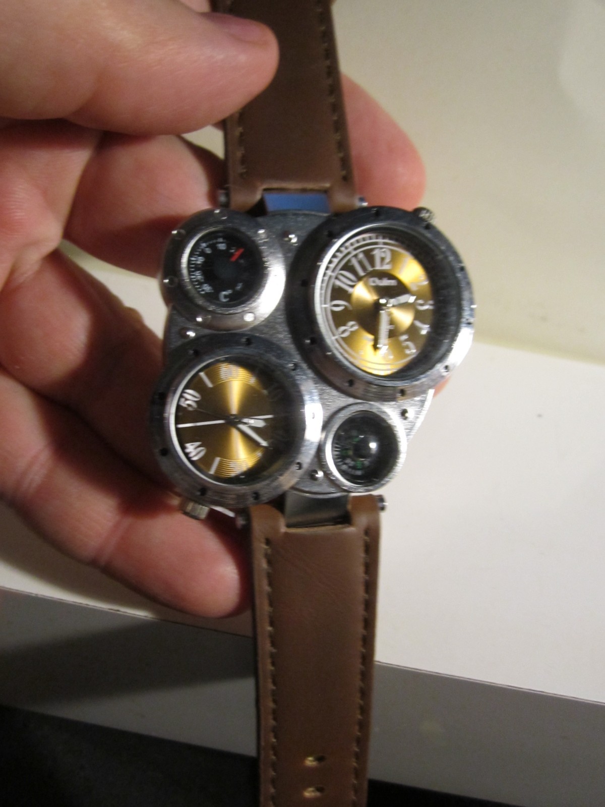 OULM WATCH MULTIPLE DIALS – TWO CLOCKS ONE COMPASS ONE CELSIUS GAUGE 9″ – OFC-W
