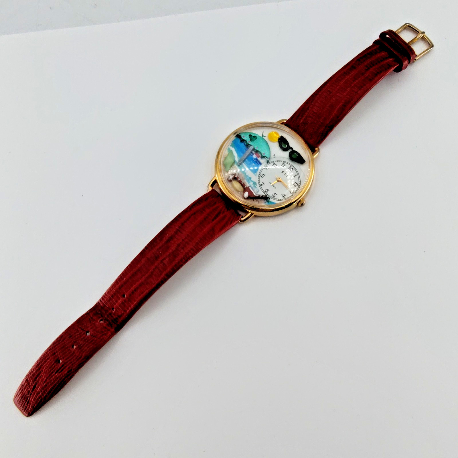 WYL “Attitude Is Everything” Gold Tone Beach Theme Leather Wristwatch
