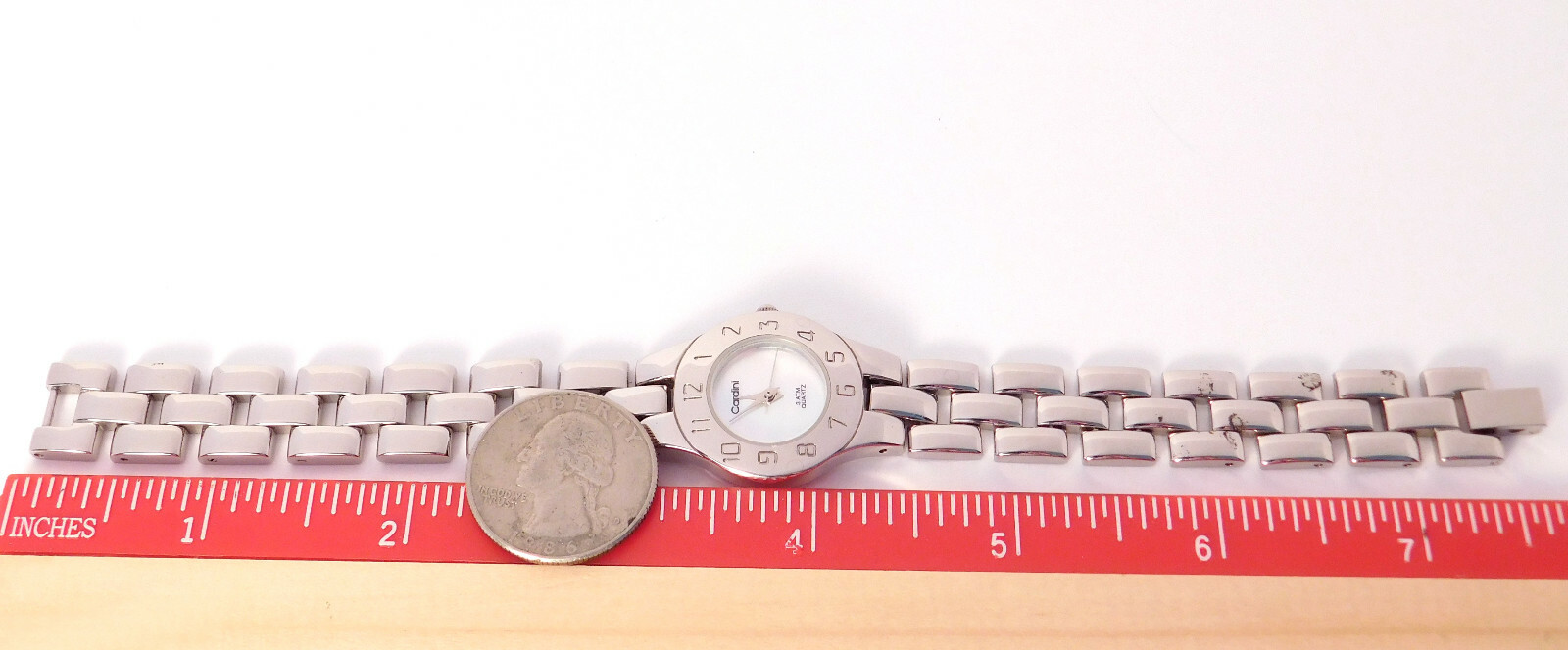 Working Cardini Watch, MOP Face, Hour Marks on Bezel, 7.5″ Band, Good Condition