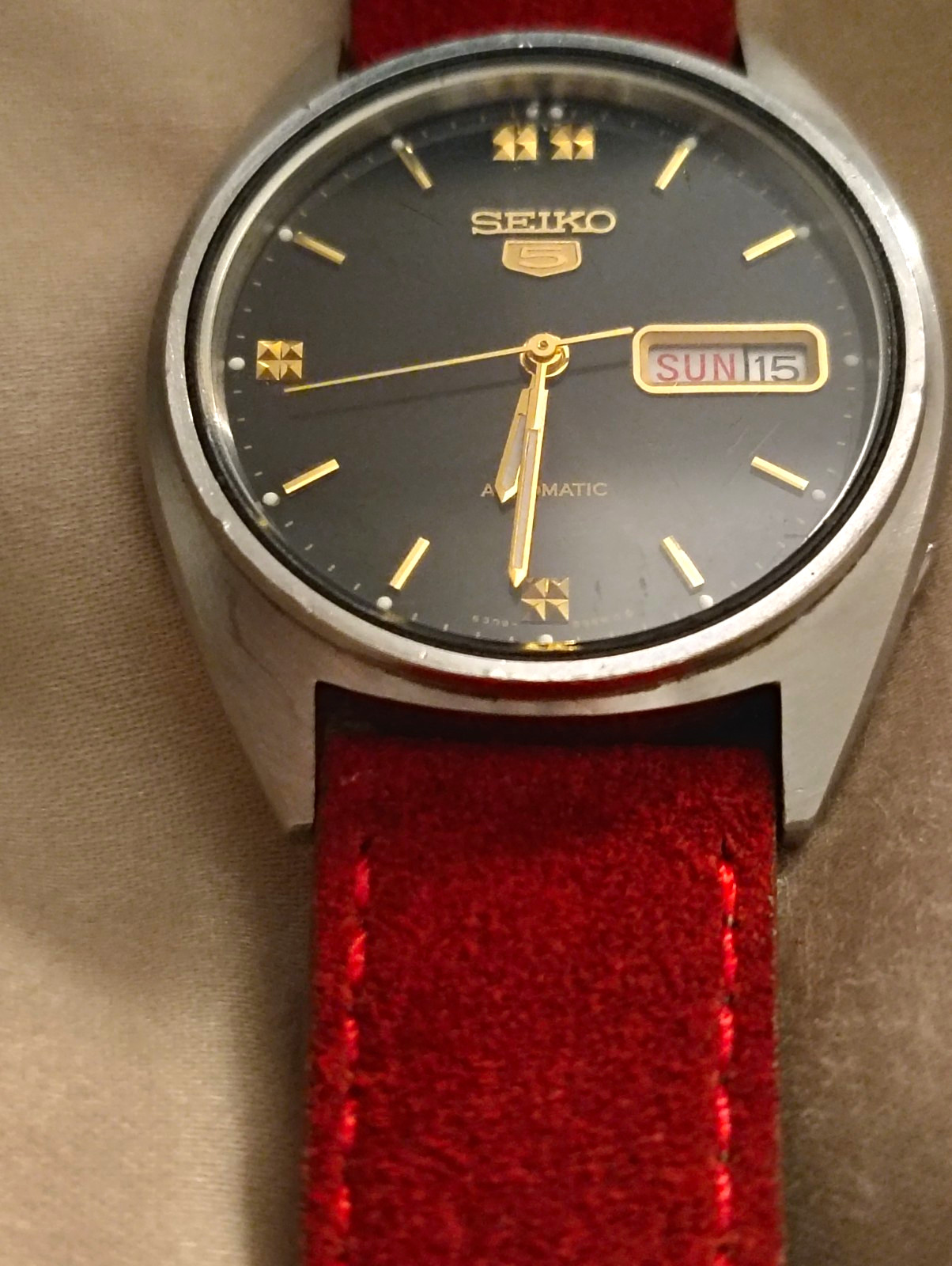 Seiko 5 Automatic Men’s 36-39mm Black Dial Stick Day/Date Red Leather Watch