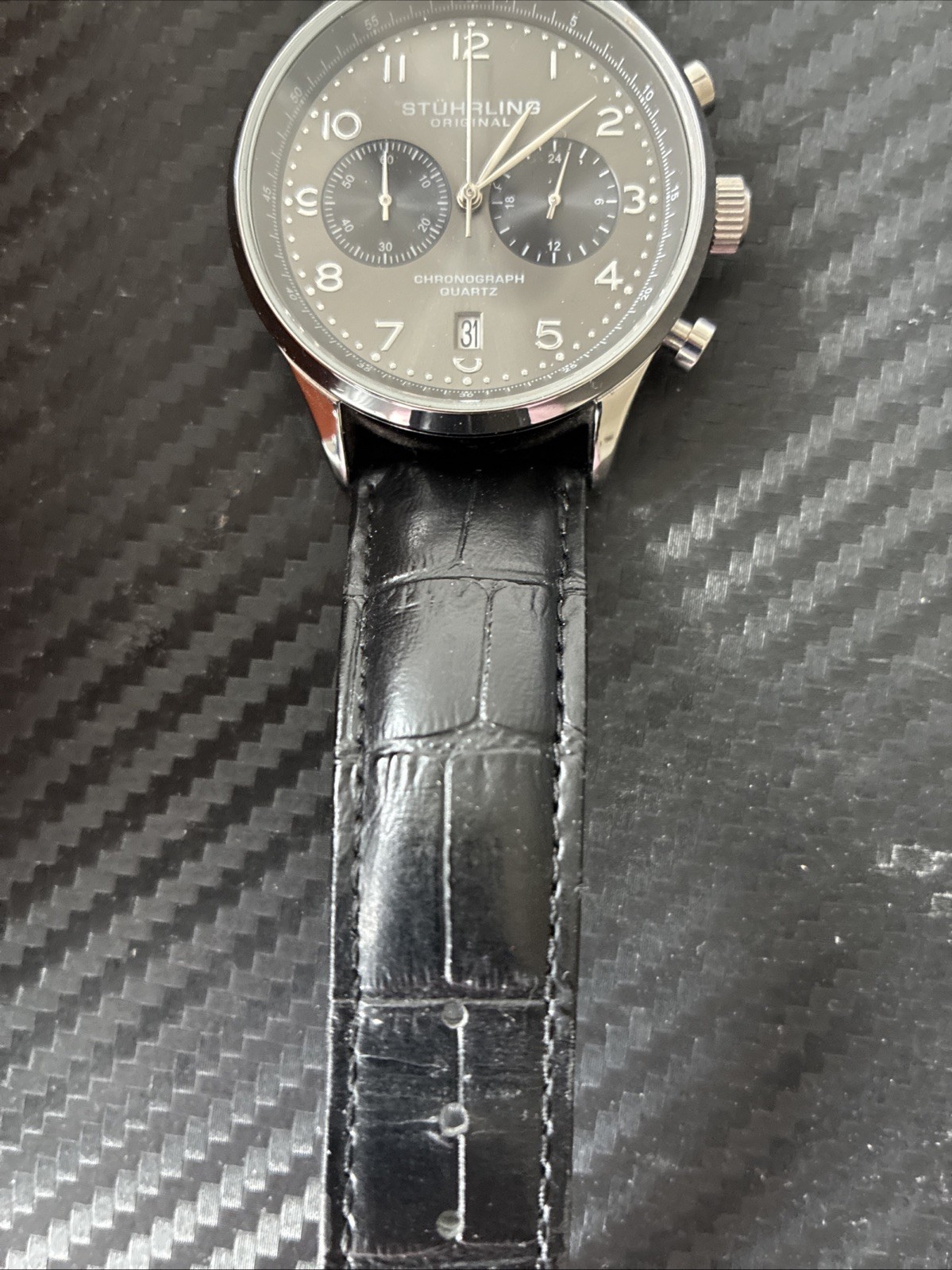 stuhrling original , water resistant, 2 years manufacturer Warranty