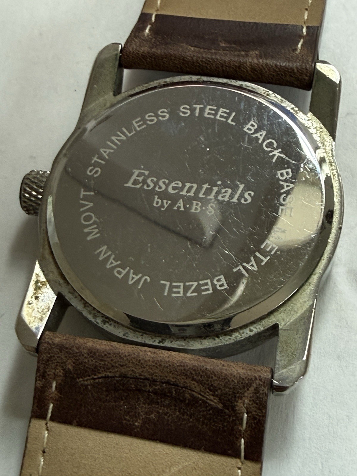 VTG MEN’s ESSENTIALS BY ABS WRISTWATCH – NEEDS BATTERY