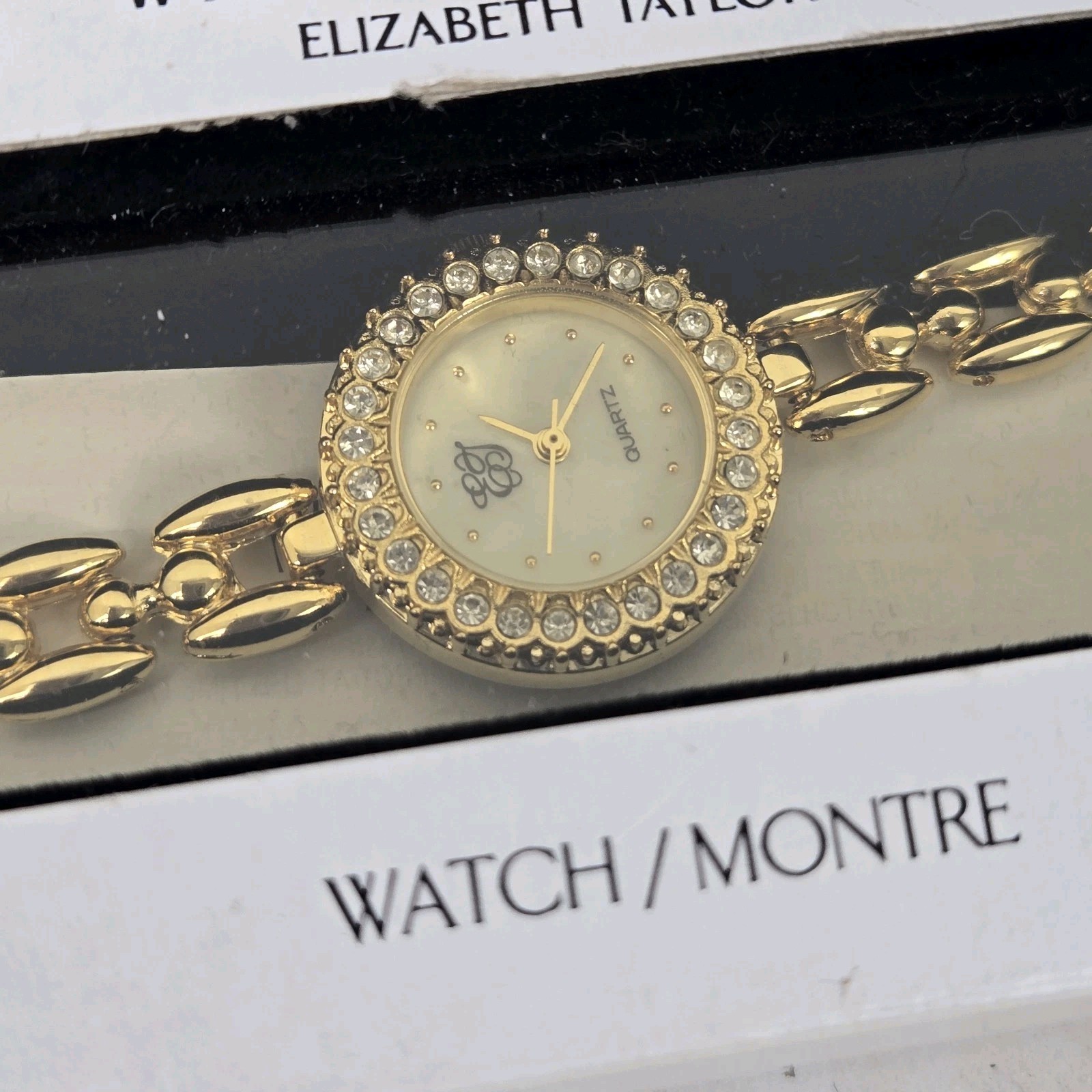 Elizabeth Taylor White Diamonds Gold Tone Rhinestone Watch HAS NEW BATTERY NOS