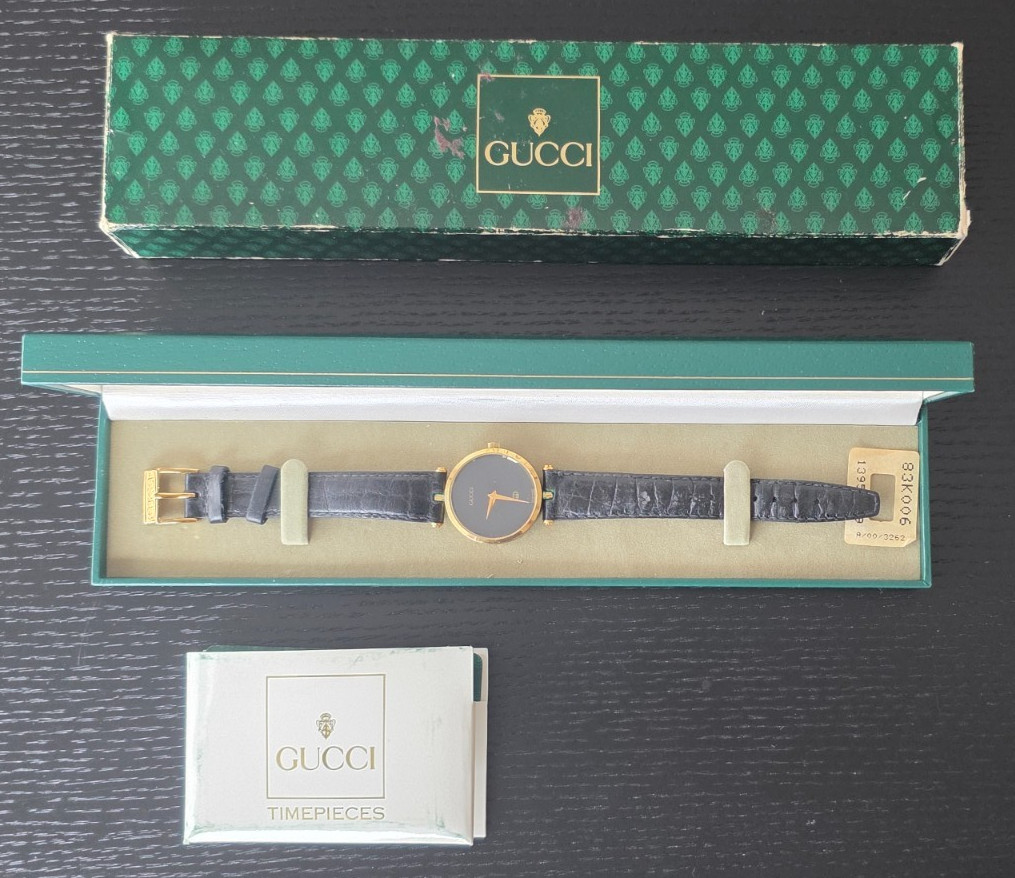 GUCCI 2000M Black Roman Dial Gold 30mm Quartz Men’s Watch