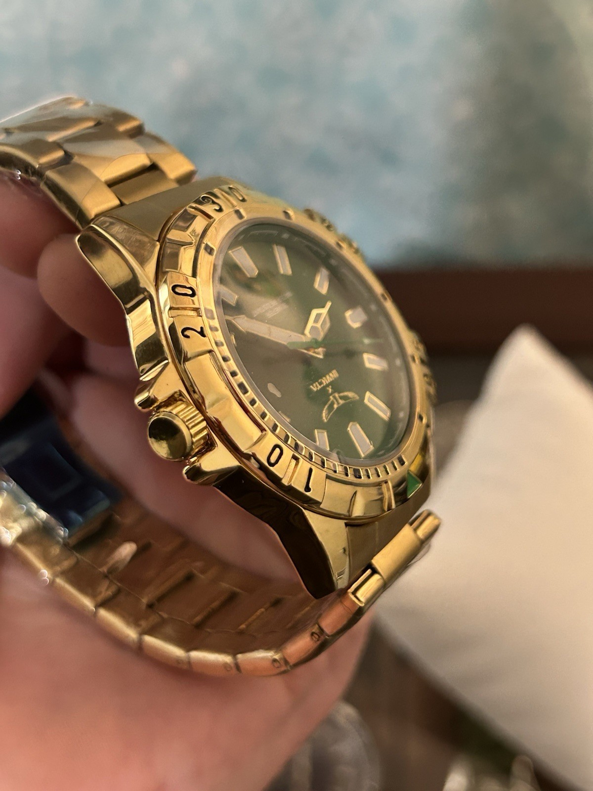 Invicta Specialty men’s watch (model 69034) a 42mm gold tone case green dial