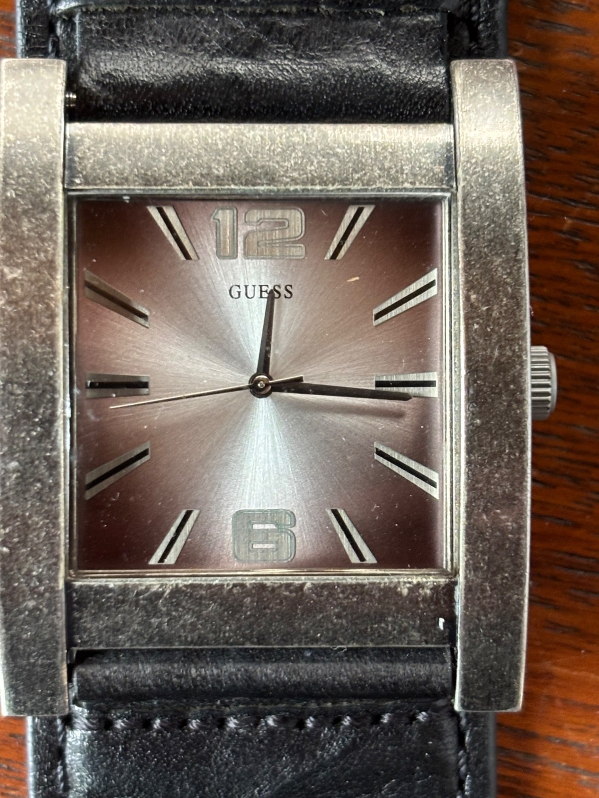 GUESS BRUSHED AGED SILVER TONE,BLACK LEATHER CUFF BAND WATCH U75016G1