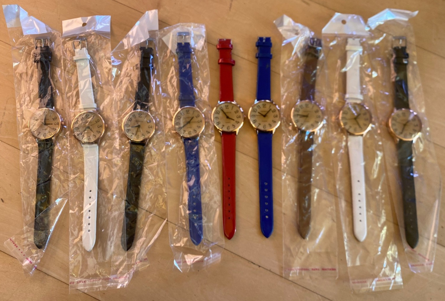 GENEVA Woman’s Quartz Watch Lot: Gold Tone – Black, White, Blue Bands – 9 pc set