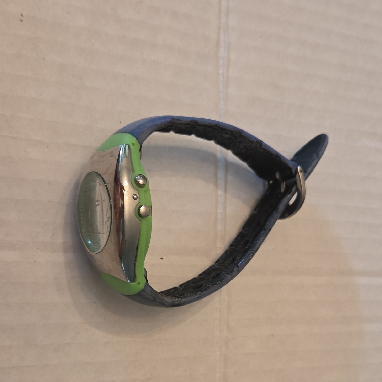 Green & Silver Dial Oval Wristwatch, Black Band, Silver Case, Arabic Numerals