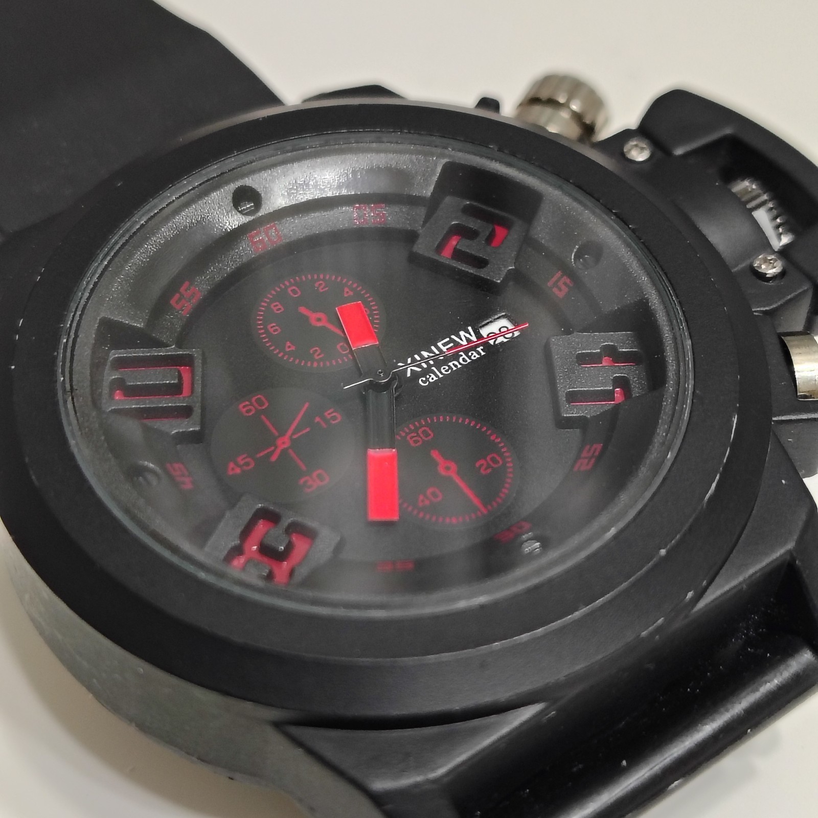 XINEW Mens watch Black Dial Date Quartz Japan Movt unique modern look