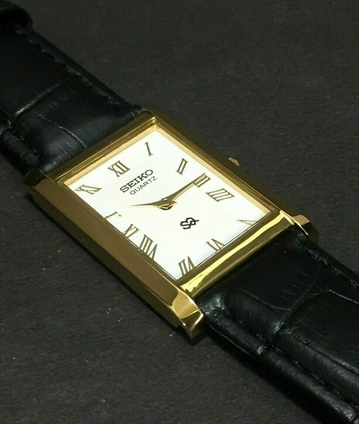 Vintage Seiko Slim Quartz Rectangle White Face Japanese 26MM Case Mens Watch A27
