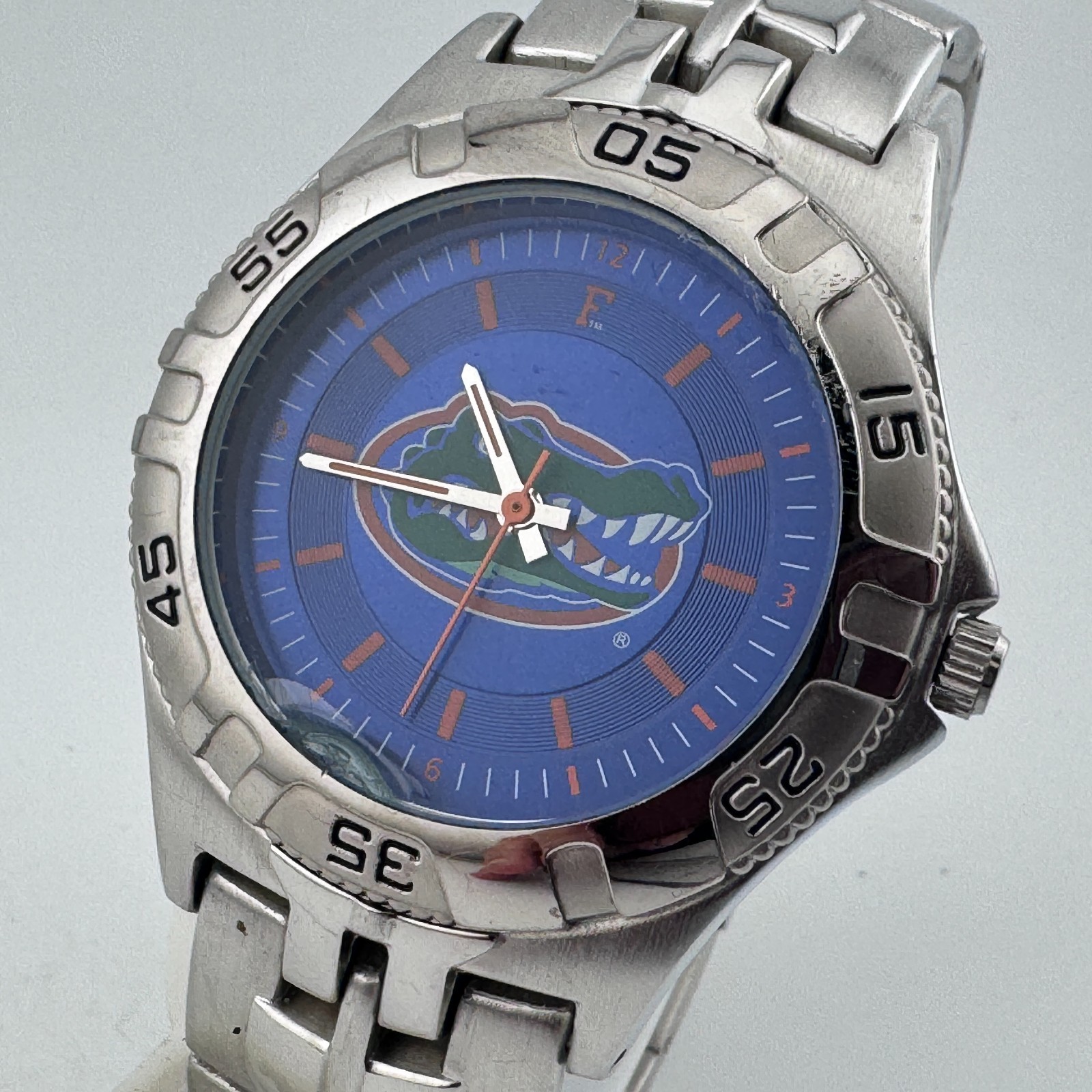 Florida Gators FMD Quartz Watch Men Silver Blue Rotating Bezel New Battery 7.5″