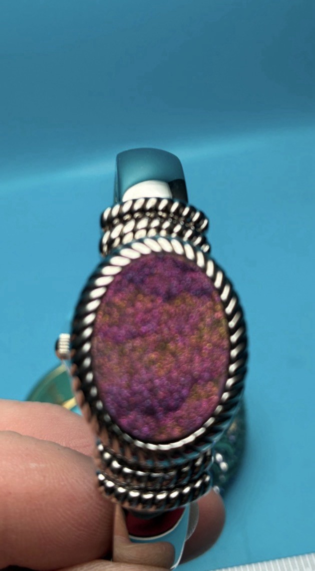 Gem Essence silver-tone watch features a distinct purple druzy stone