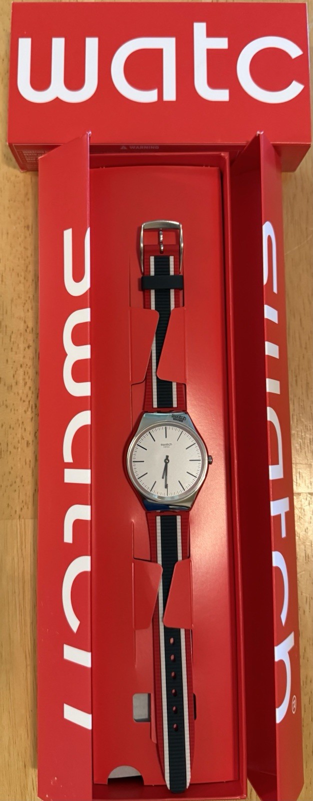 Swatch Skin Irony Quartz White Dial Silver Steel 38mm Red/White/Blue Strap w/Box