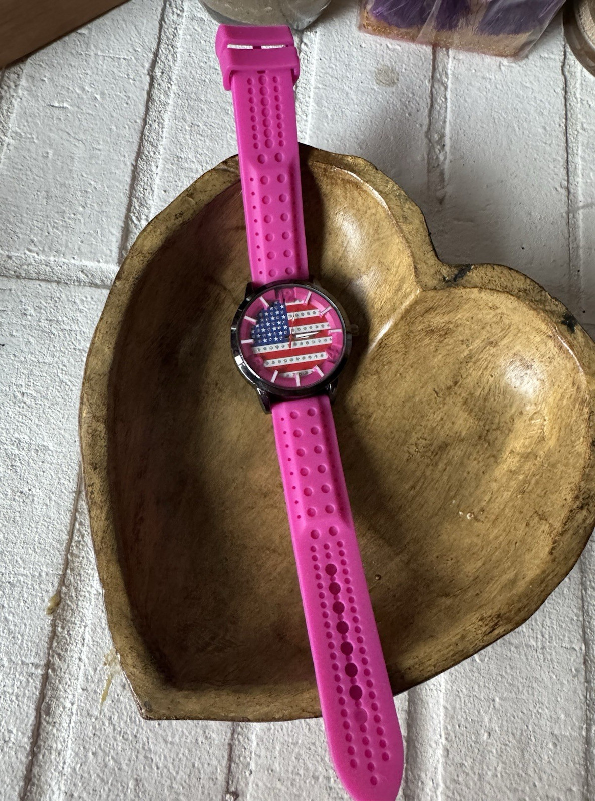 Women’s analog wristwatch pink silicone band American Flag dial silver case