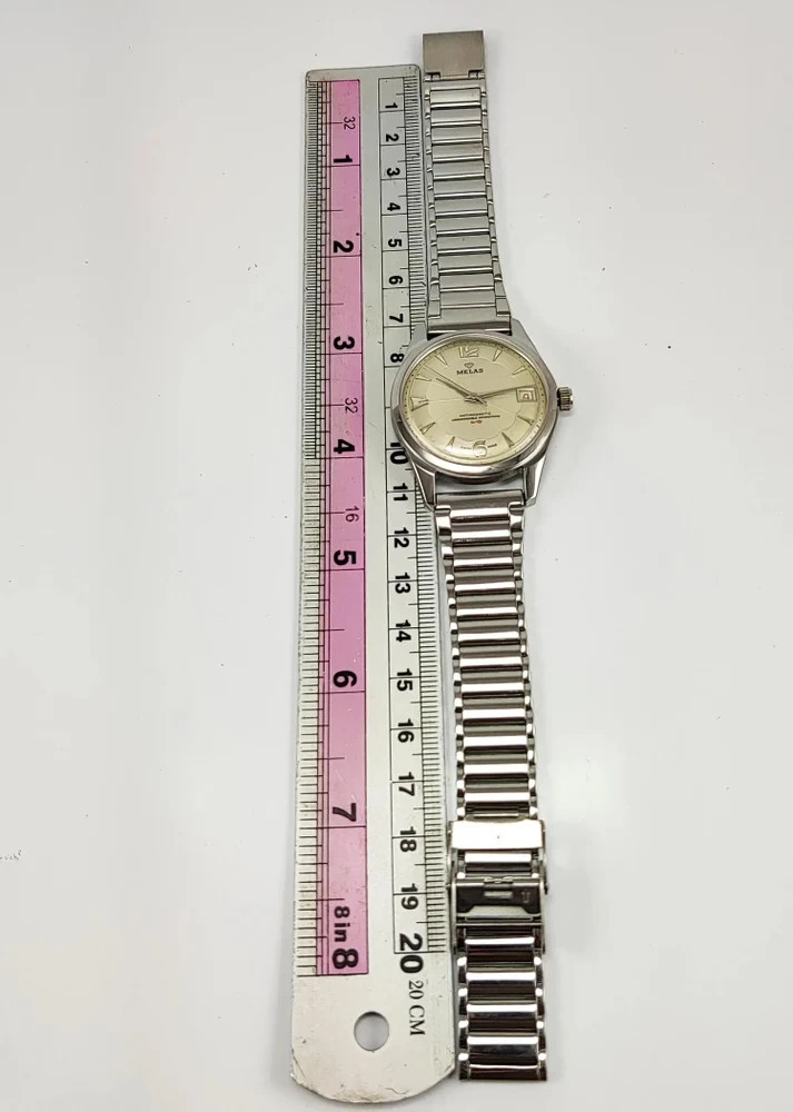 Working Melas Pearl Dial Date Function Handwinding Transparent Back Wrist Watch