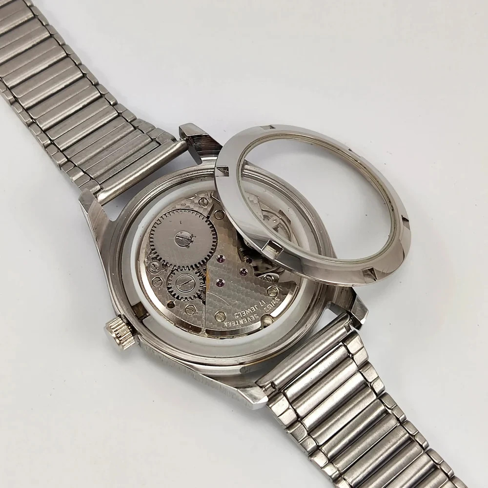 Working Melas Pearl Dial Date Function Handwinding Transparent Back Wrist Watch