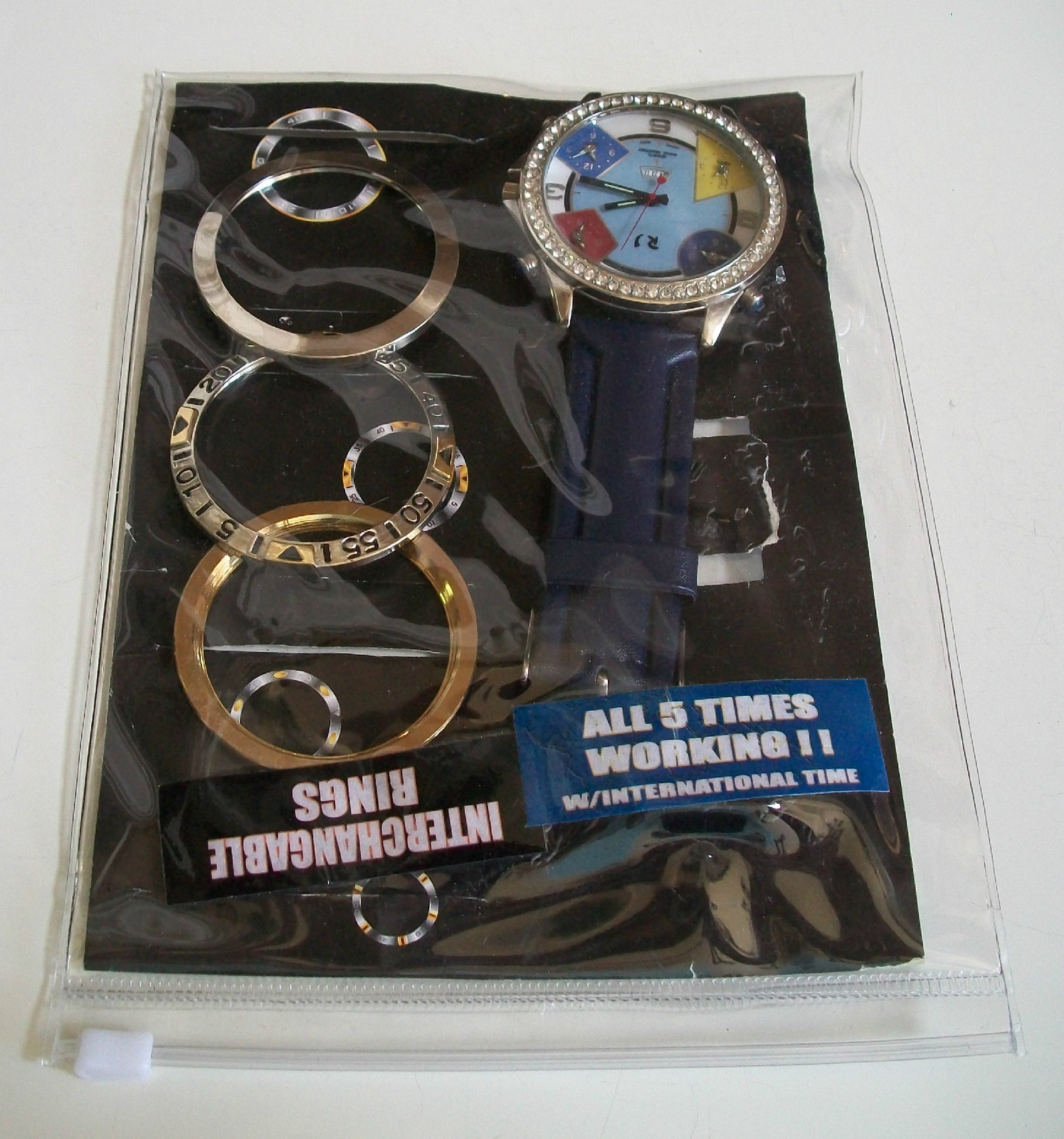 RJ CZ/Plain Bezel 5 Time Zone Date Men’s Fashion Watch With Pouch & Extra Bezel
