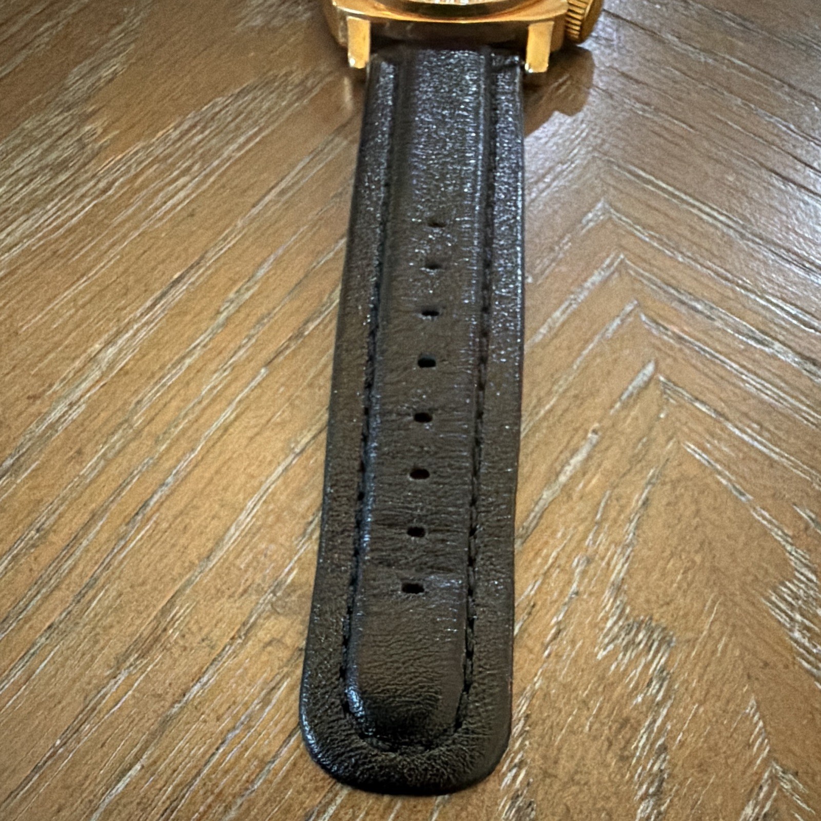 Marc Ecko E10525G1 Quartz Analog Watch Gold Dial Black Leather Strap 52mm 50m