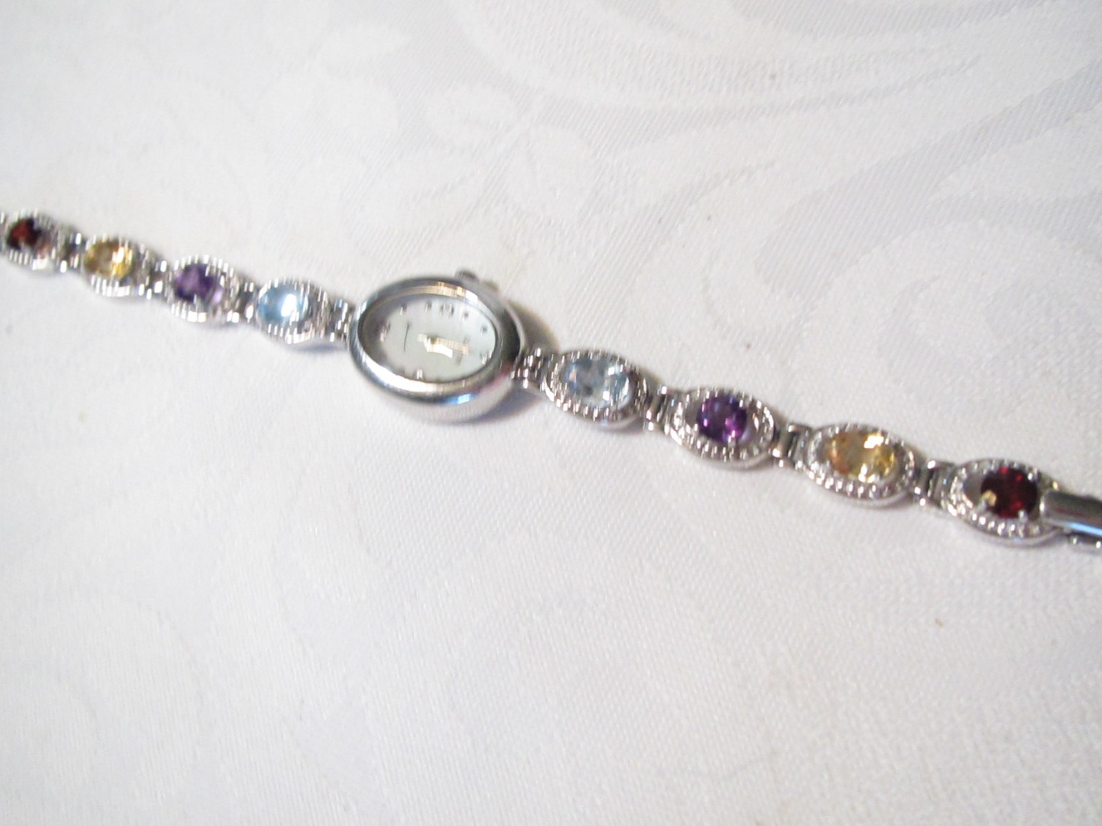 BEAUTIFUL STERLING SILVER MULTI GENUINE GEMSTONES 7 1/4″ QUARTZ WATCH – 29.6 GR.