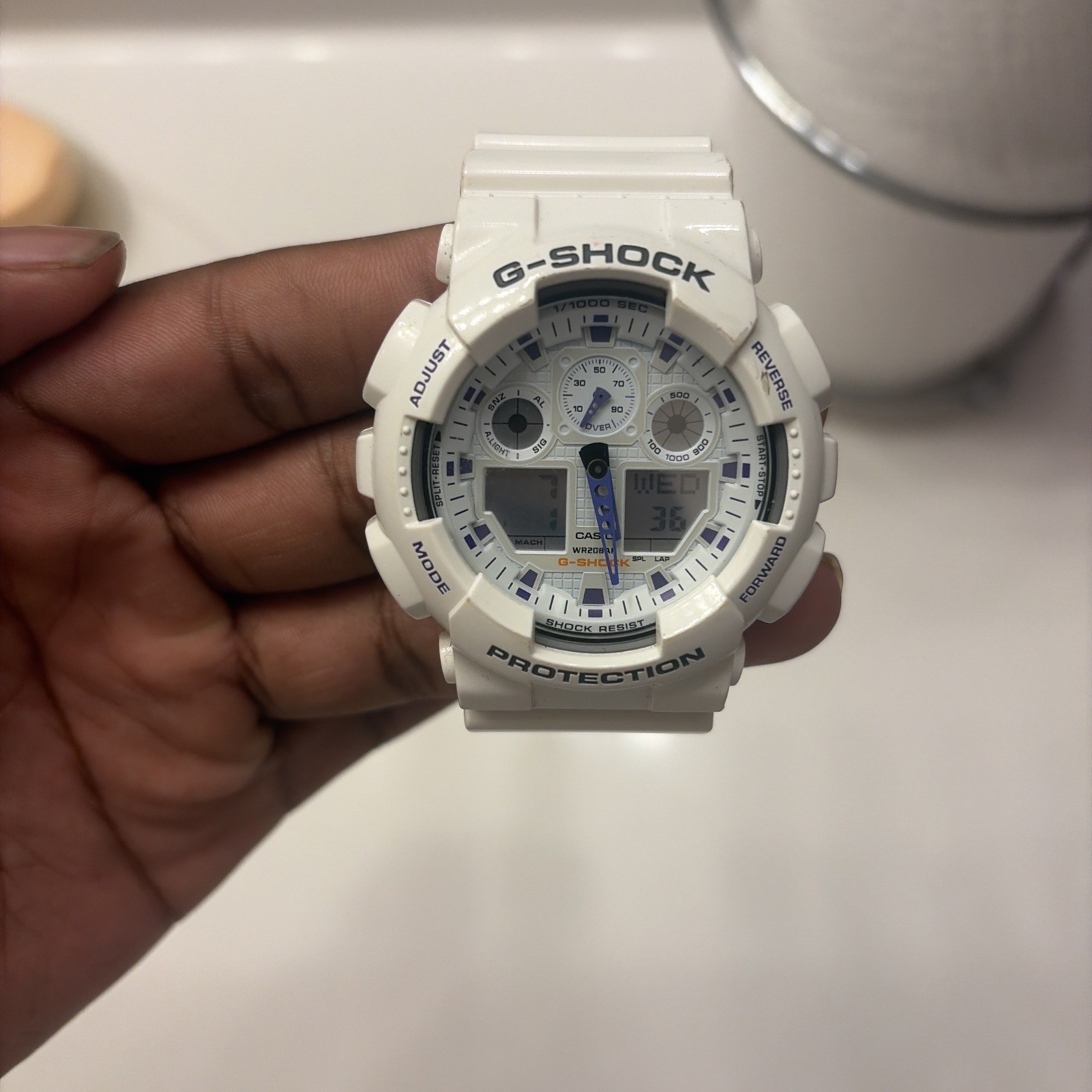 Casio G-SHOCK GA-100A White / Purple Analog-Digital Shock-Resistant Watch 200m
