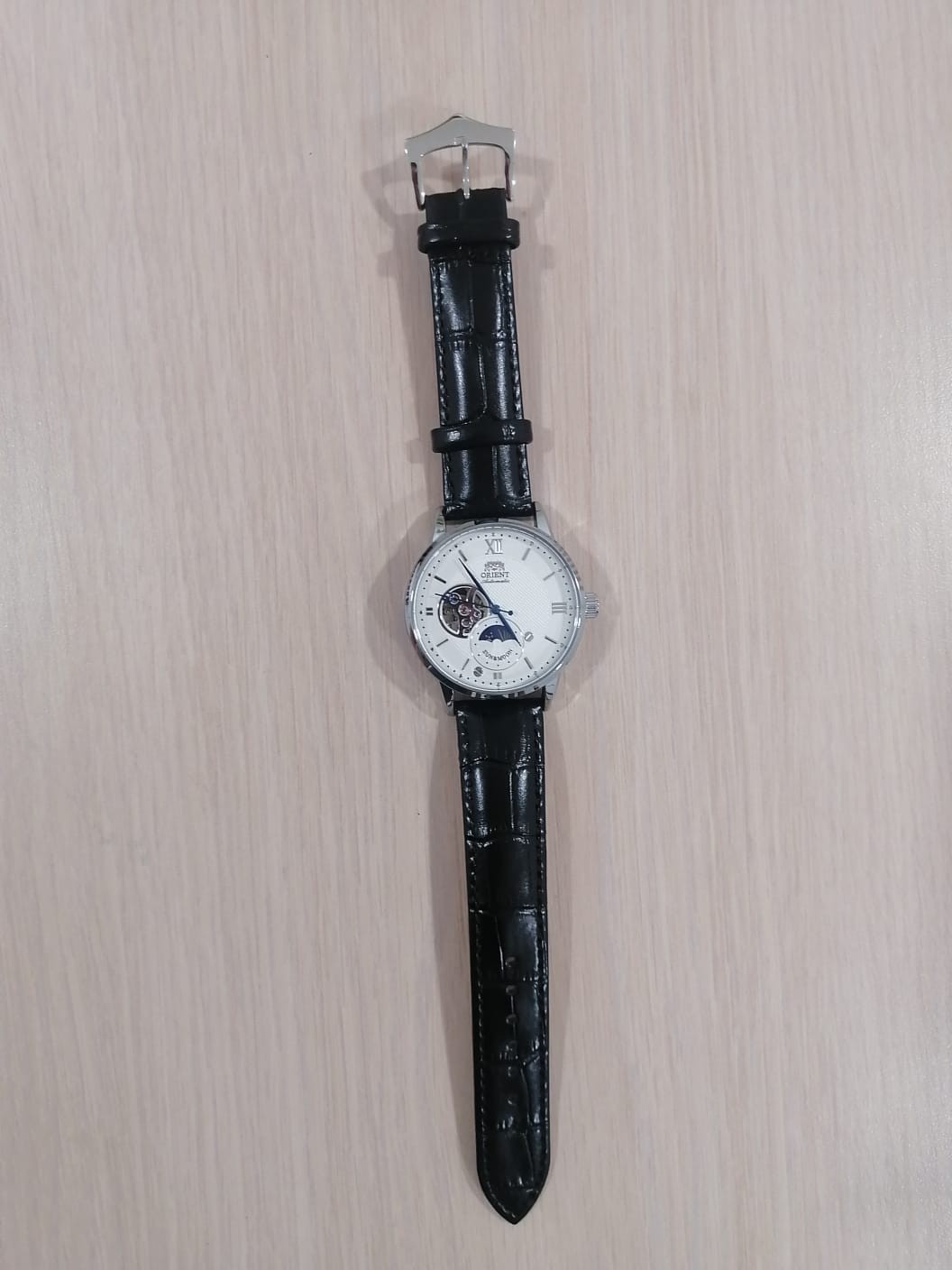 Orient Sun & Moon Automatic Watch – Semi‑Skeleton Dial, Luxury Men’s Mechanical.