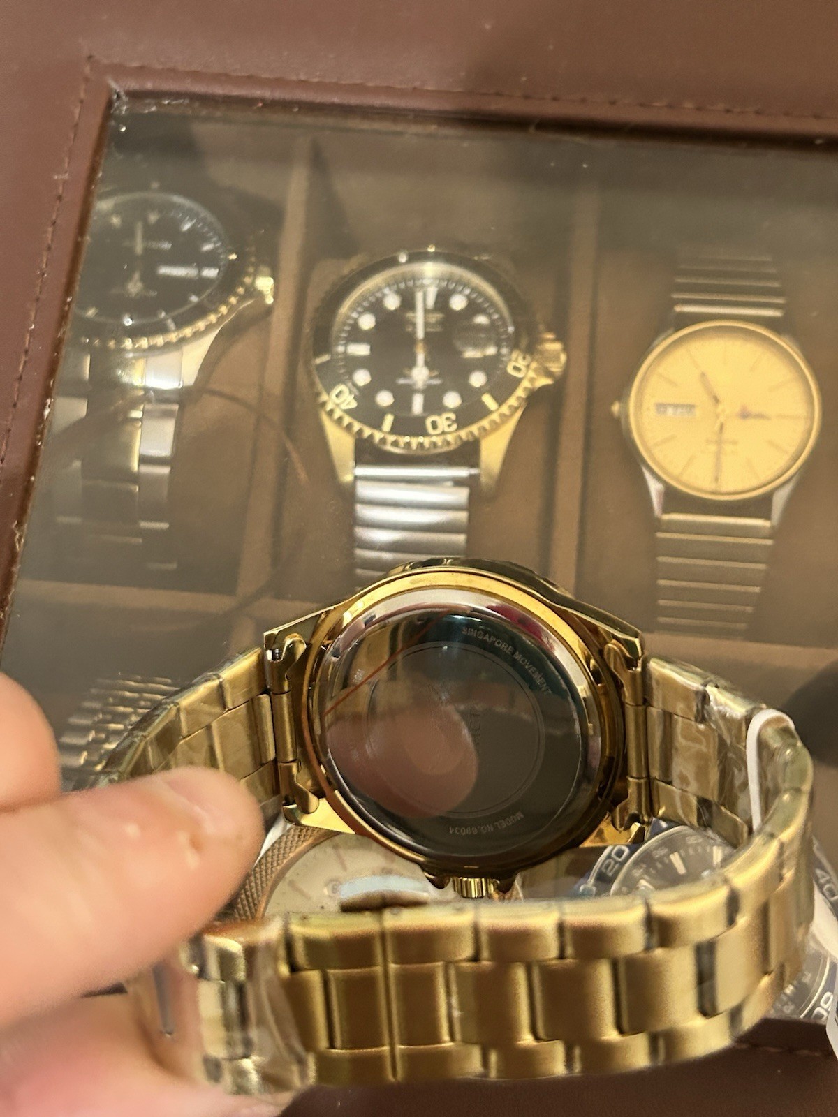 Invicta Specialty men’s watch (model 69034) a 42mm gold tone case green dial