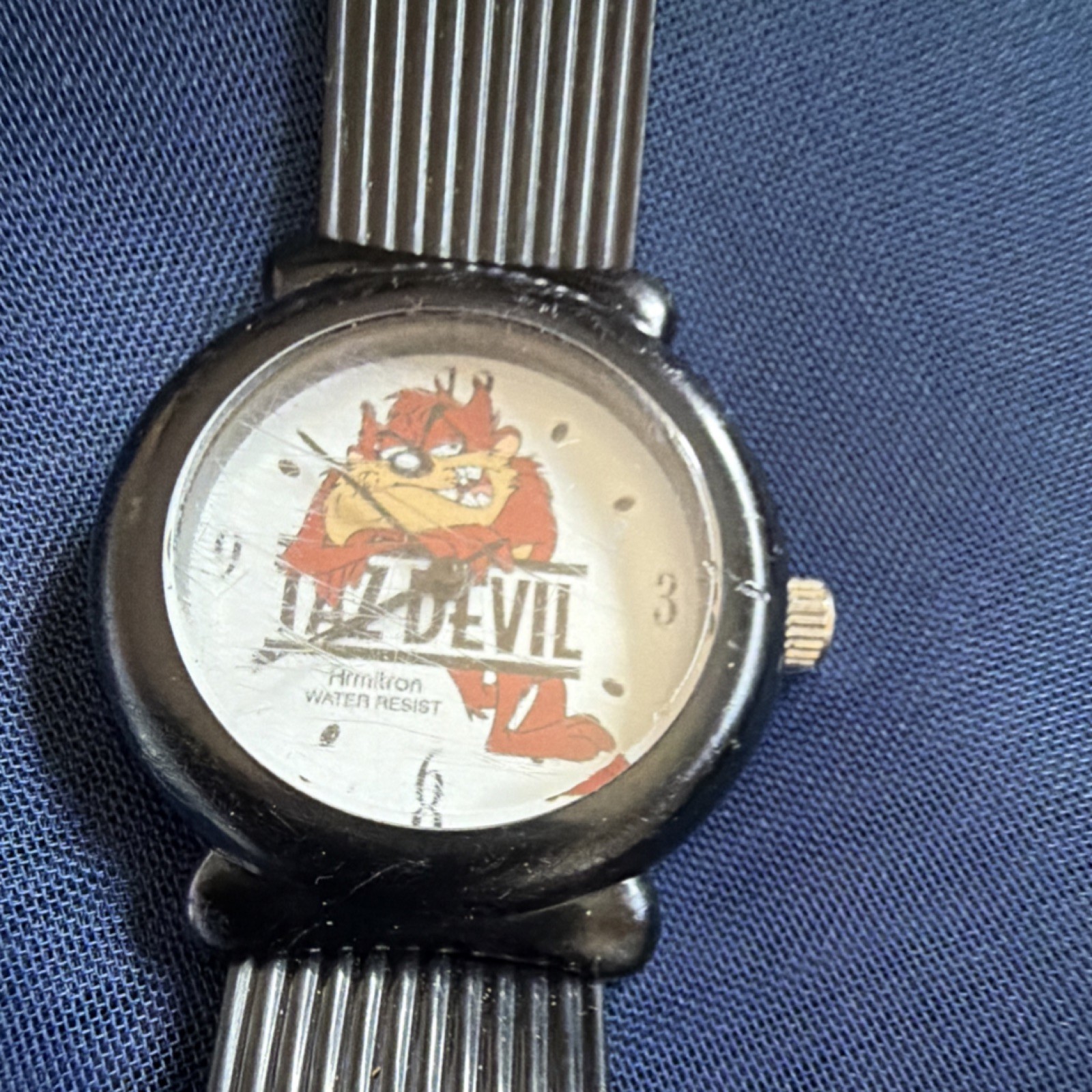 Armitron Taz Quartz Analog Wristwatch Water-Resistant White Dial Black Plastic