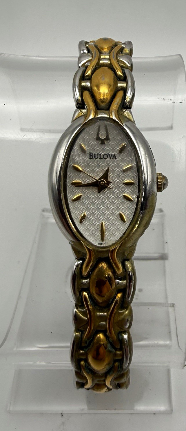 Bulova Womens Analog Oval Two-Tone SS Bracelet Silver Dial Baton Dress Watch