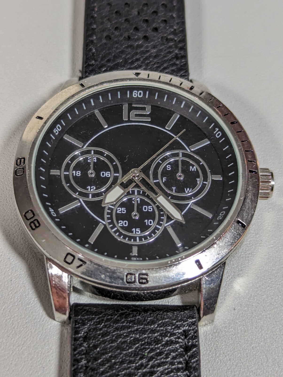 Black Dial Round Silver Tone Case Black Faux Leather Band Watch