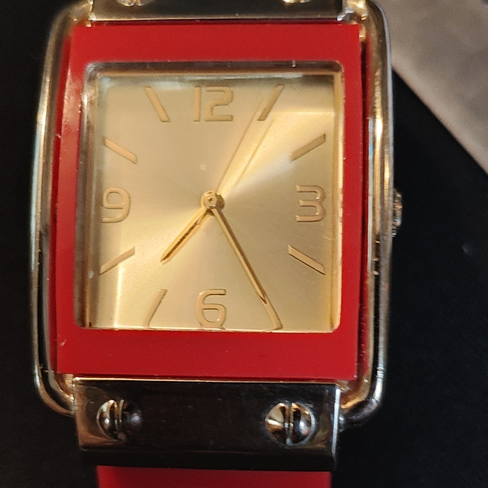 Rectangular Wristwatch Red Bangle Silver Red Case Analog Gold Sunburst Dial.