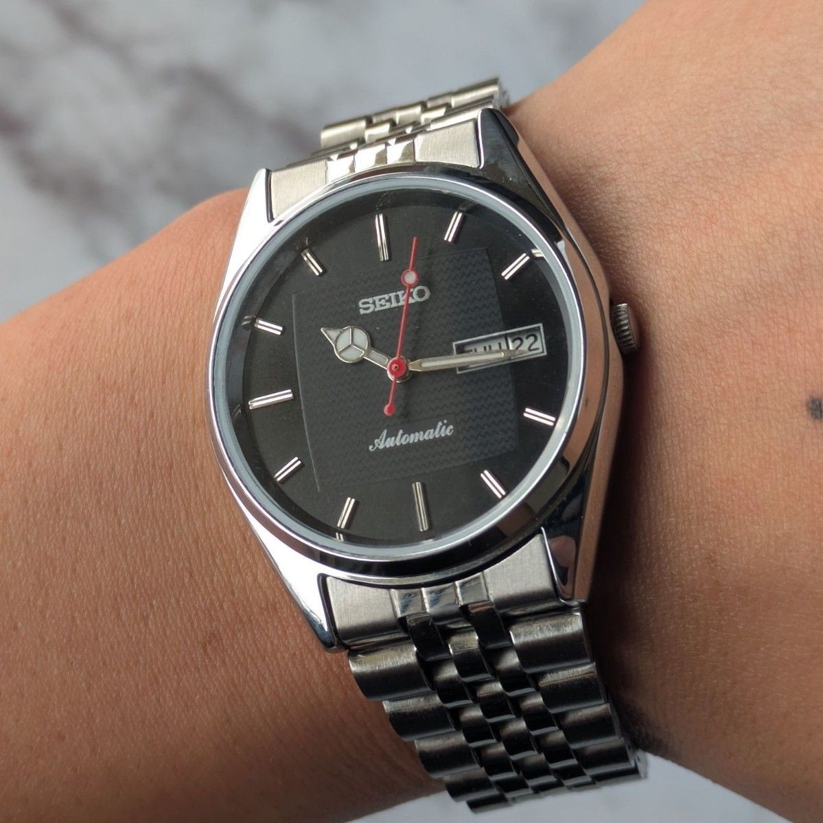 Working SEIKO Automatic 80s Vintage Black Dial Bar Index Ripple 3 Hands Skeleton
