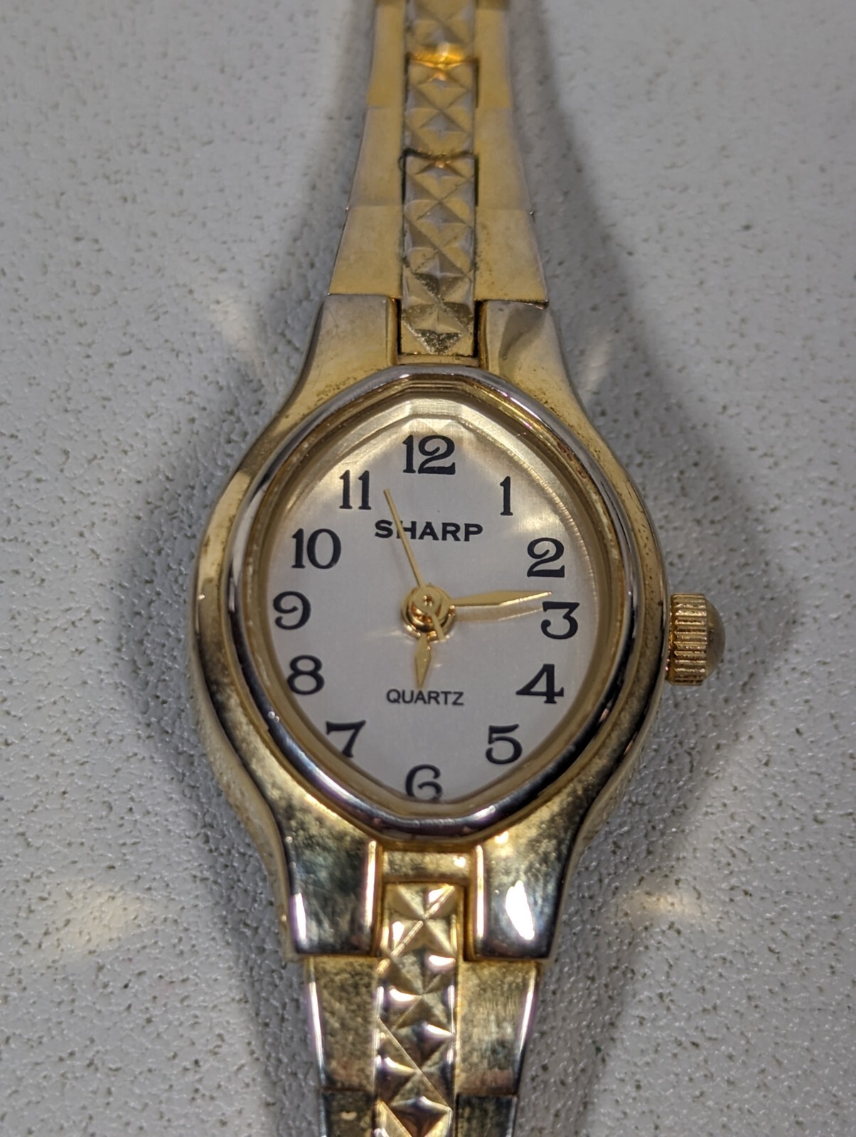 Sharp Womans Silver Dial GoldTone Oval Case Textured Bracelet Band Watch 6.75 in